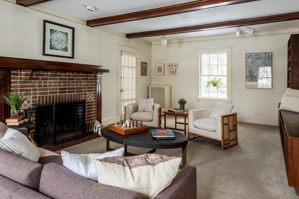 46 Pine Ridge Road Newton, MA 02468 - Photo 3 of 18 a living room with furniture a fireplace and a window