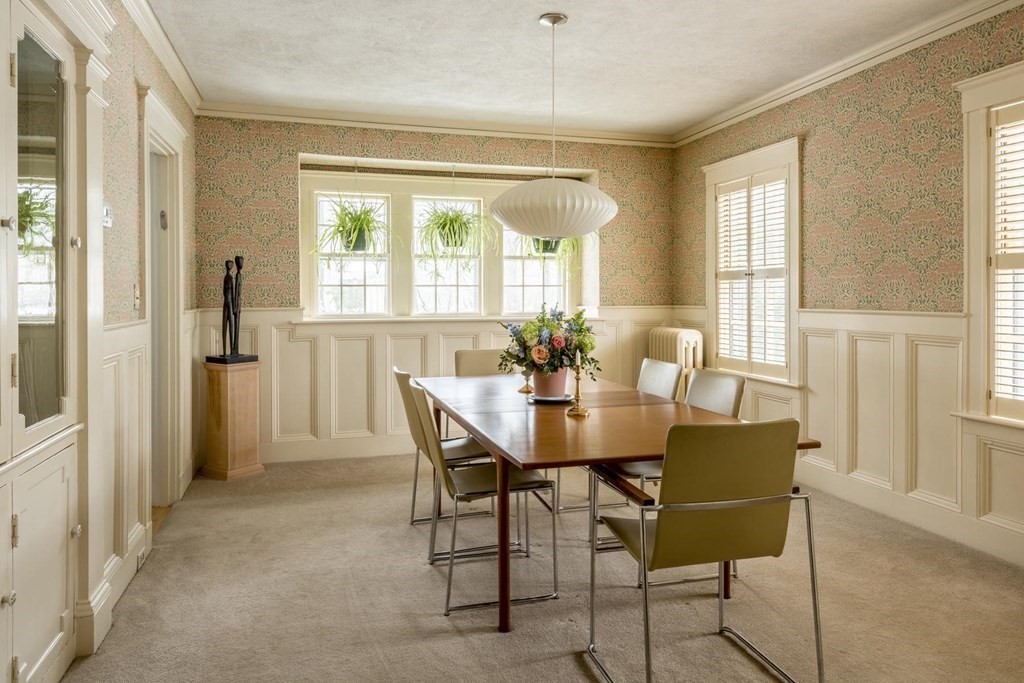 46 Pine Ridge Road Newton, MA 02468 - Photo 4 of 18 a view of a dining room with furniture and a potted plant