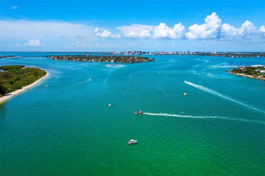 1050 Longboat Club Road, Unit 903 Longboat Key, FL 34228 - Photo 53 of 59 a view of a golf course with a lake