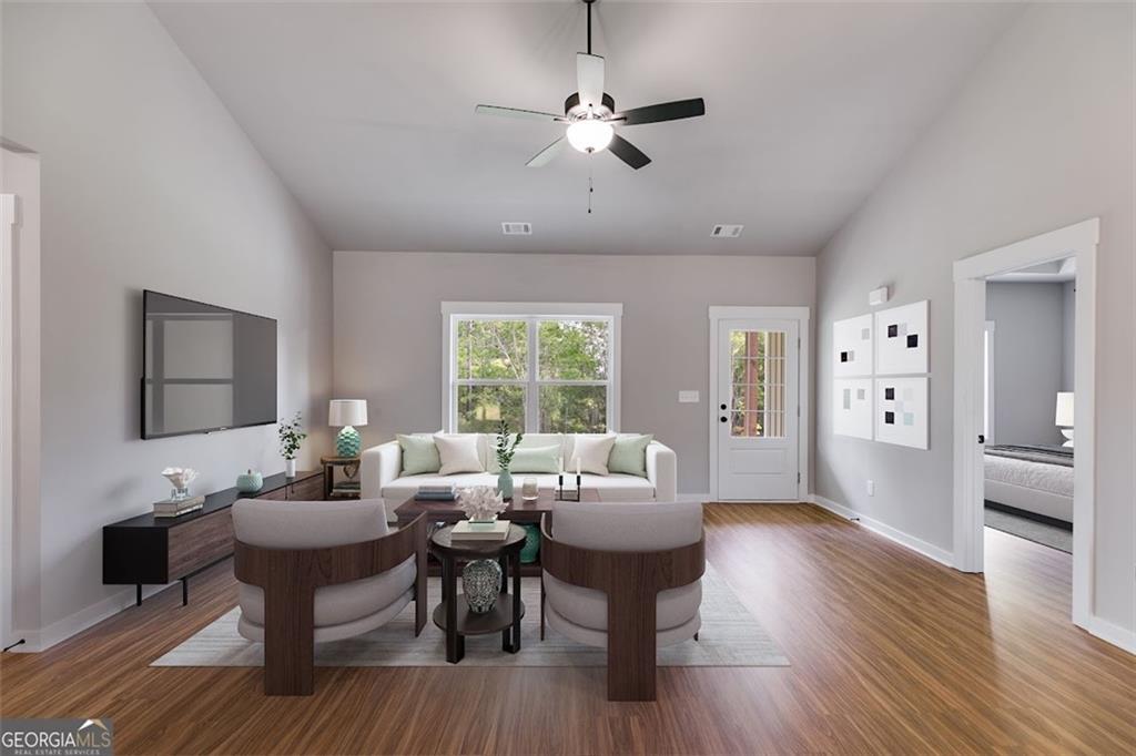 525 Grogan Road Buchanan, GA 30113 - Photo 19 of 40 a living room with furniture and a large window