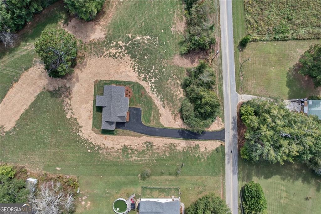 525 Grogan Road Buchanan, GA 30113 - Photo 9 of 40 an aerial view of a house with a yard