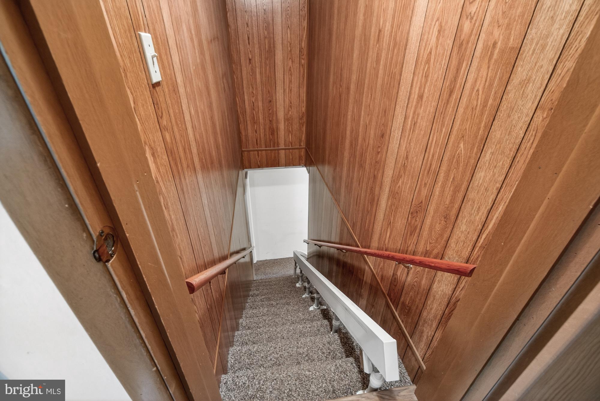 5601 Woodville Road Mount Airy, MD 21771 - Photo 30 of 54 Stairs to Lower Level with Chair Lift