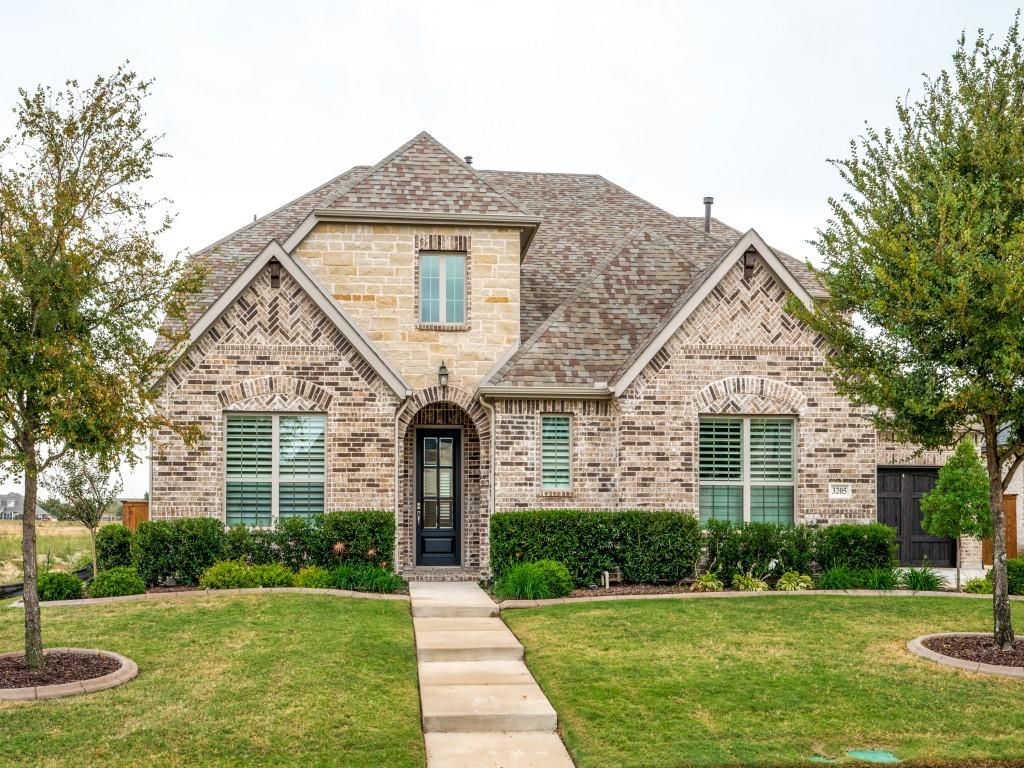 3205 Twin Eagles Drive Celina, TX 75009 - Photo 1 of 1 a front view of a house with a yard