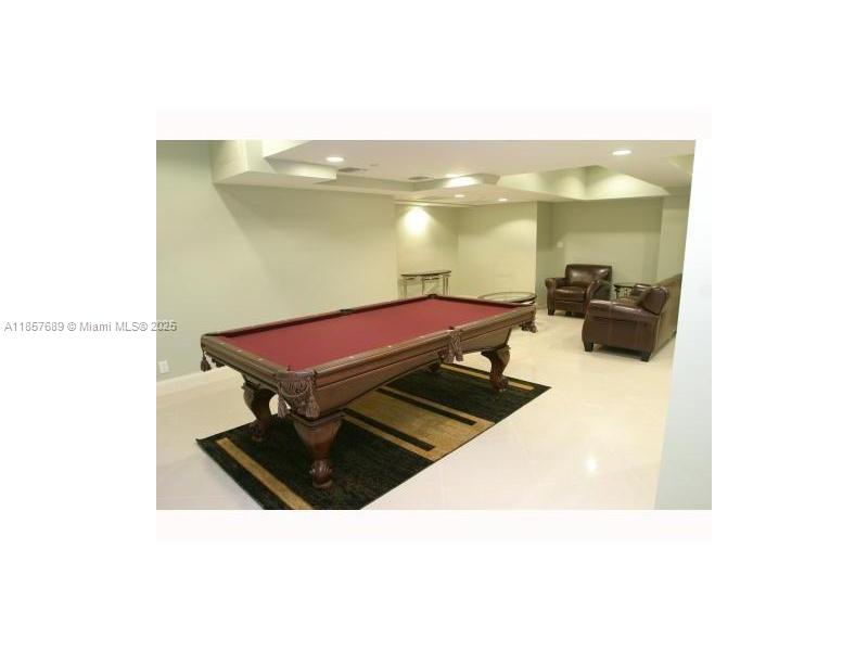 111 East Flagler Street, Unit 1007 Miami, FL 33131 - Photo 13 of 13 a living room with furniture