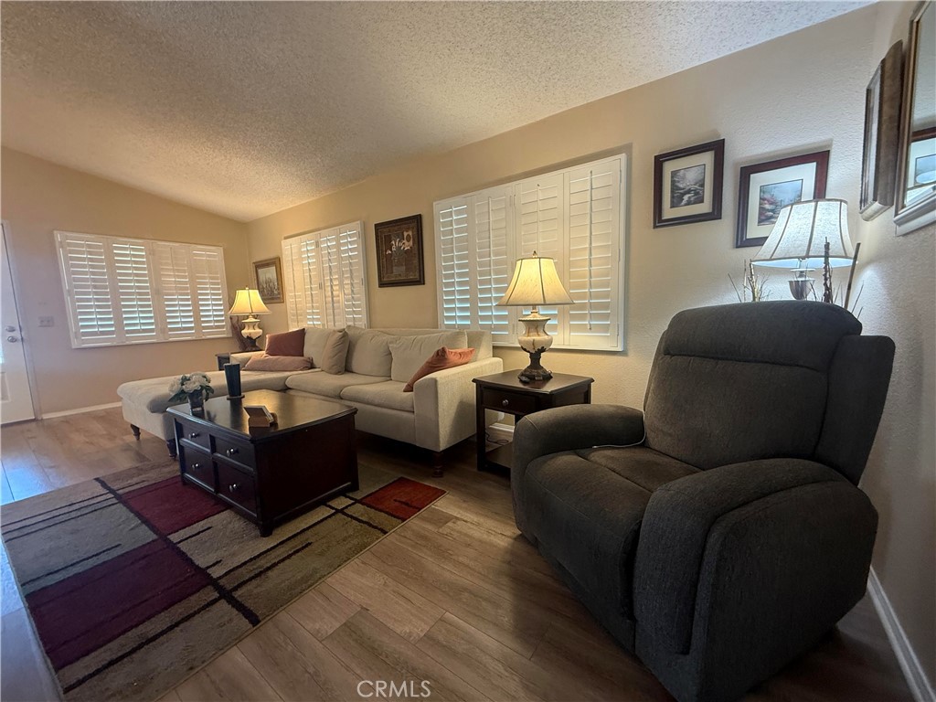 31130 South General Kearny Road, Unit 153 Temecula, CA 92591 - Photo 12 of 38 a living room with furniture or couch and a window