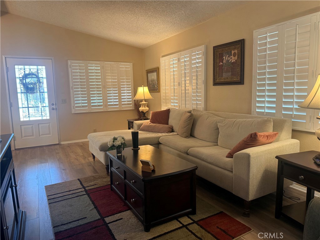 31130 South General Kearny Road, Unit 153 Temecula, CA 92591 - Photo 13 of 38 a living room with furniture and a window