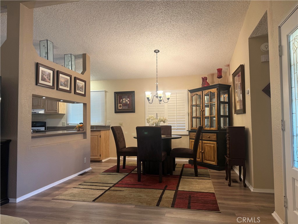 31130 South General Kearny Road, Unit 153 Temecula, CA 92591 - Photo 17 of 38 a dining room with furniture and window