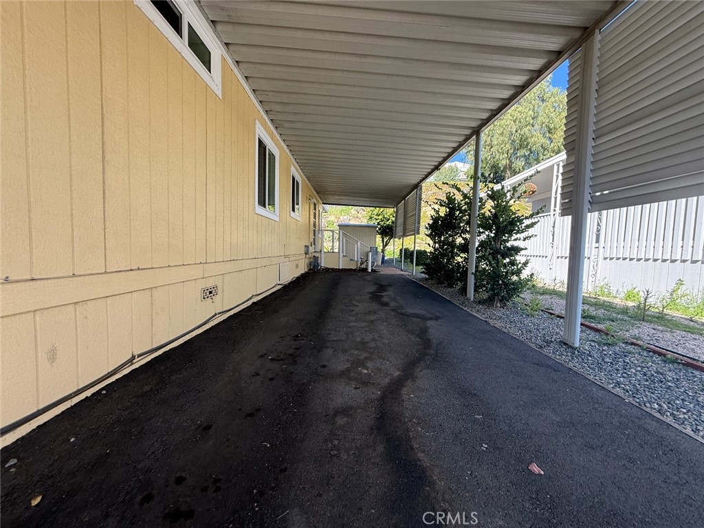 31130 South General Kearny Road, Unit 153 Temecula, CA 92591 - Photo 36 of 38 a view of a house with backyard and garden