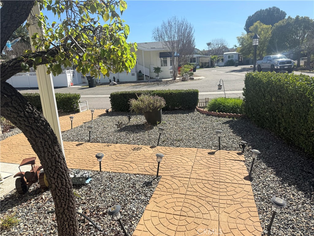31130 South General Kearny Road, Unit 153 Temecula, CA 92591 - Photo 7 of 38 a view of a house with backyard and sitting area