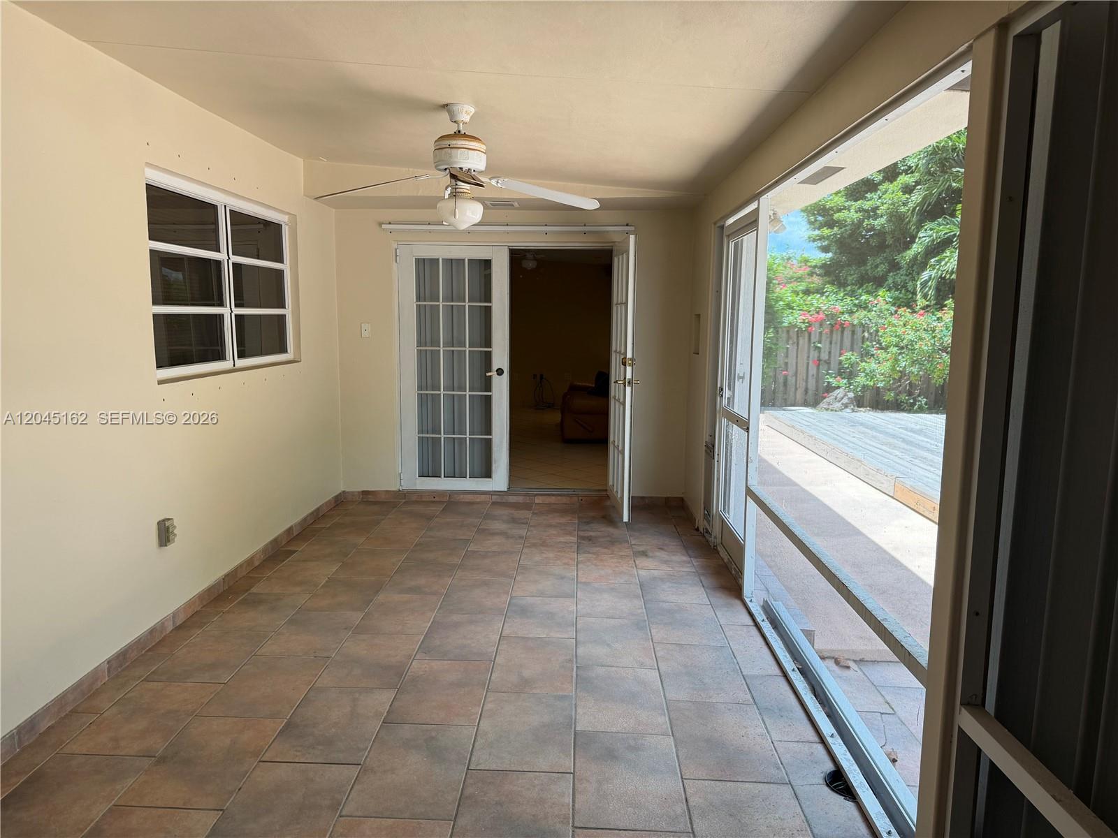 3262 Southwest 139th Place Miami, FL 33175 - Photo 25 of 36 a view of an empty room with a window