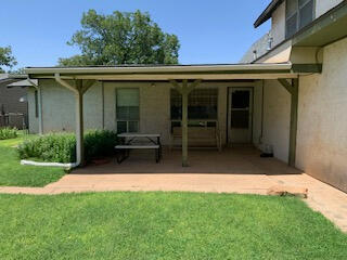 1809 West 19th Plainview, TX 79072 - Photo 17 of 19 a view of house with backyard space and garden
