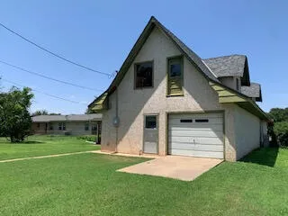 front view of house with a yard