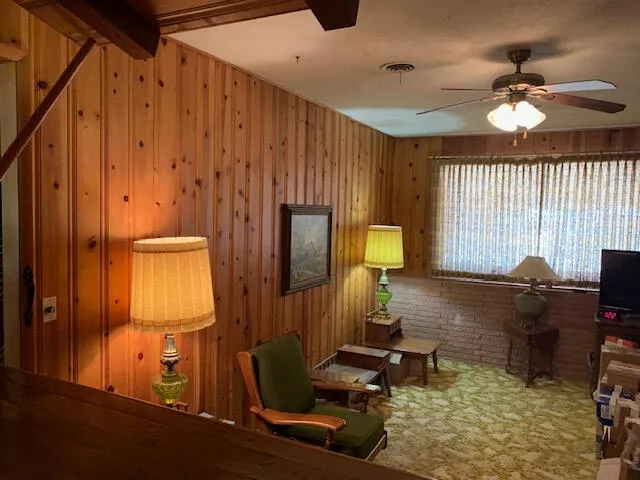 a room with furniture and wooden floor