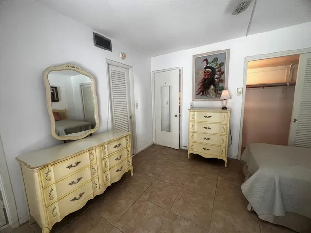 a bathroom with a double vanity sink and mirror