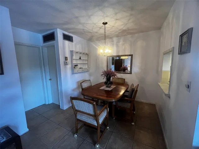 a view of a workspace with furniture