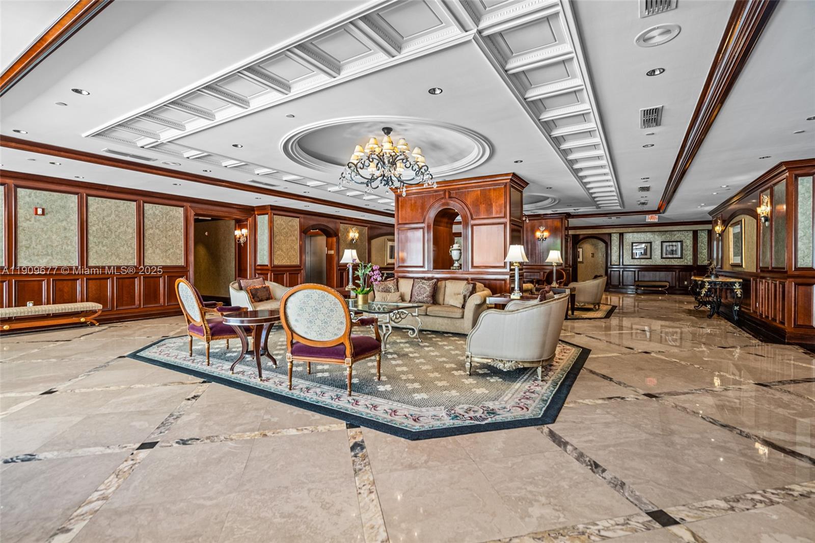 9559 Collins Avenue, Unit S8F Surfside, FL 33154 - Photo 22 of 27 a view of a dining room with furniture chandelier and a rug