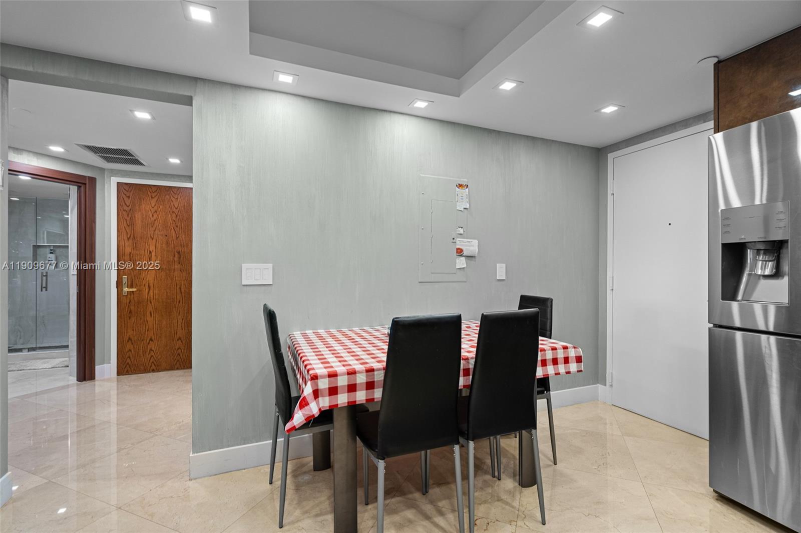9559 Collins Avenue, Unit S8F Surfside, FL 33154 - Photo 6 of 27 a view of a dining room with furniture