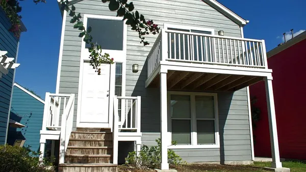 front view of a house with a deck