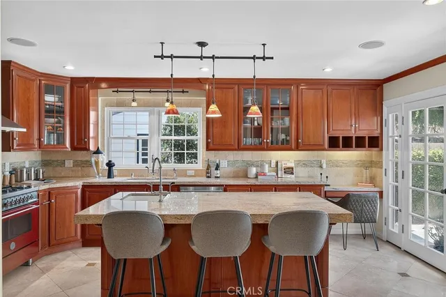 a bathroom with a sink and a large mirror