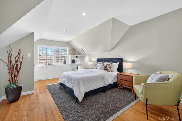 a view of a patio with table and chairs under an umbrella