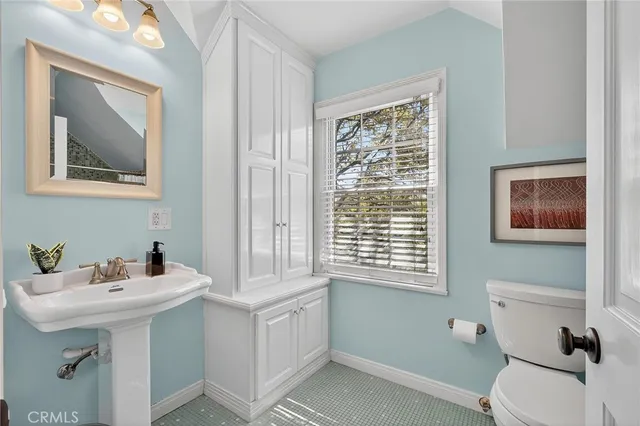 a view of a couches and dinning table and chairs in patio