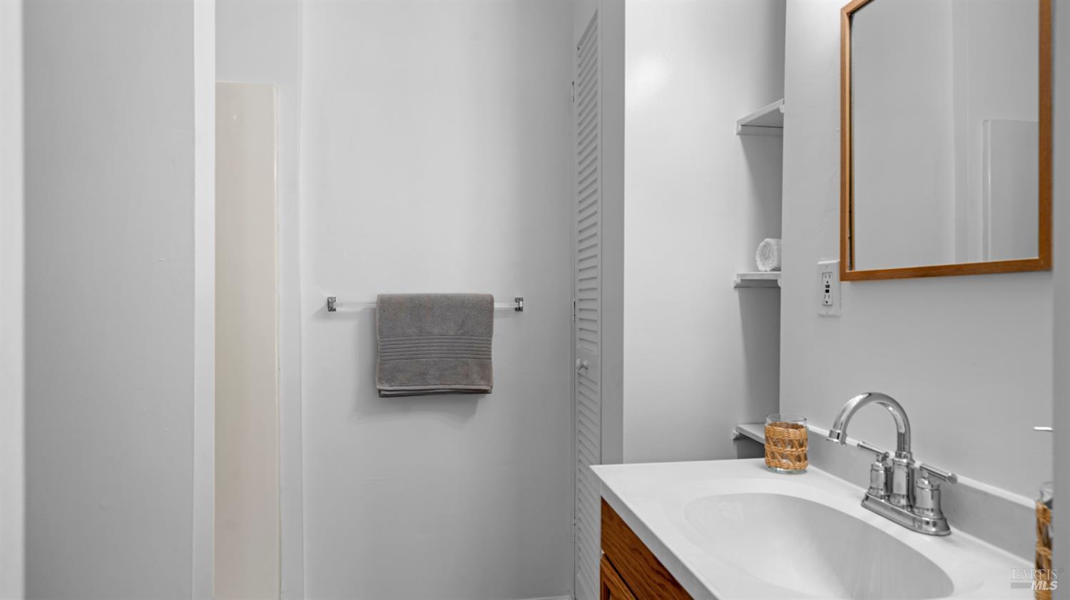 38 Bret Avenue San Rafael, CA 94901 - Photo 51 of 52 a bathroom with a sink and a mirror
