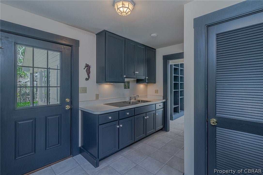 85 Rivers Bend Road Lancaster, VA 22503 - Photo 26 of 46 Mud Room with sink & cabinets with separate entrance