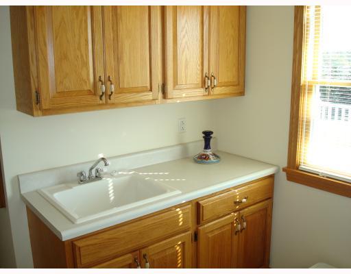 122 Spring Ridge Drive Butler, PA 16001 - Photo 17 of 18 Other. Built in sink and counter space in the laundry room.