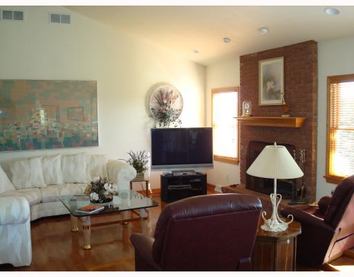 122 Spring Ridge Drive Butler, PA 16001 - Photo 6 of 18 Den/Family/Great Room. Cathedral ceiling in the family room, dining area and kitchen.