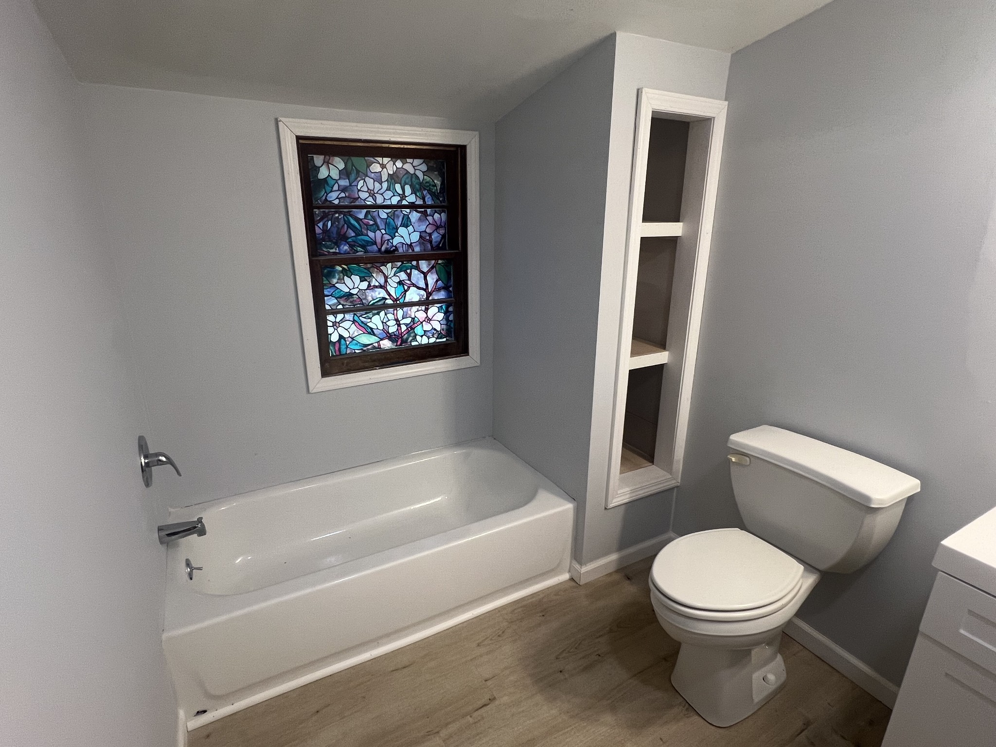 161 Woodlawn Road Pulaski, TN 38478 - Photo 15 of 46 a white toilet sitting next to a bath tub