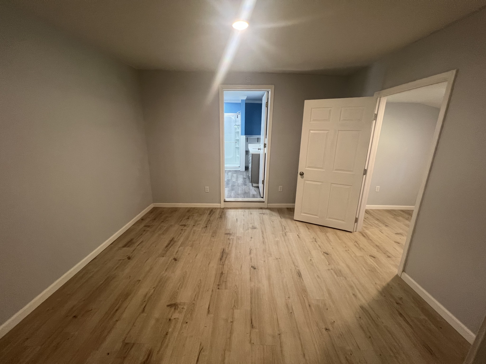 161 Woodlawn Road Pulaski, TN 38478 - Photo 24 of 46 wooden floor in an empty room with a window