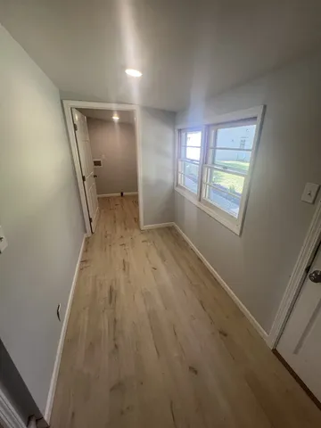 an empty room with windows