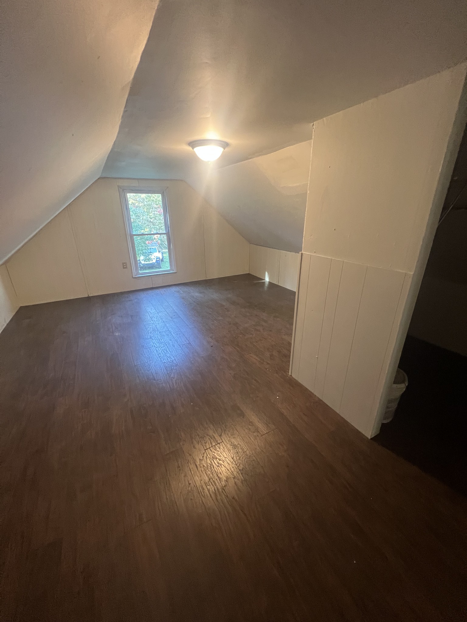 161 Woodlawn Road Pulaski, TN 38478 - Photo 30 of 46 an empty room with wooden floor and windows