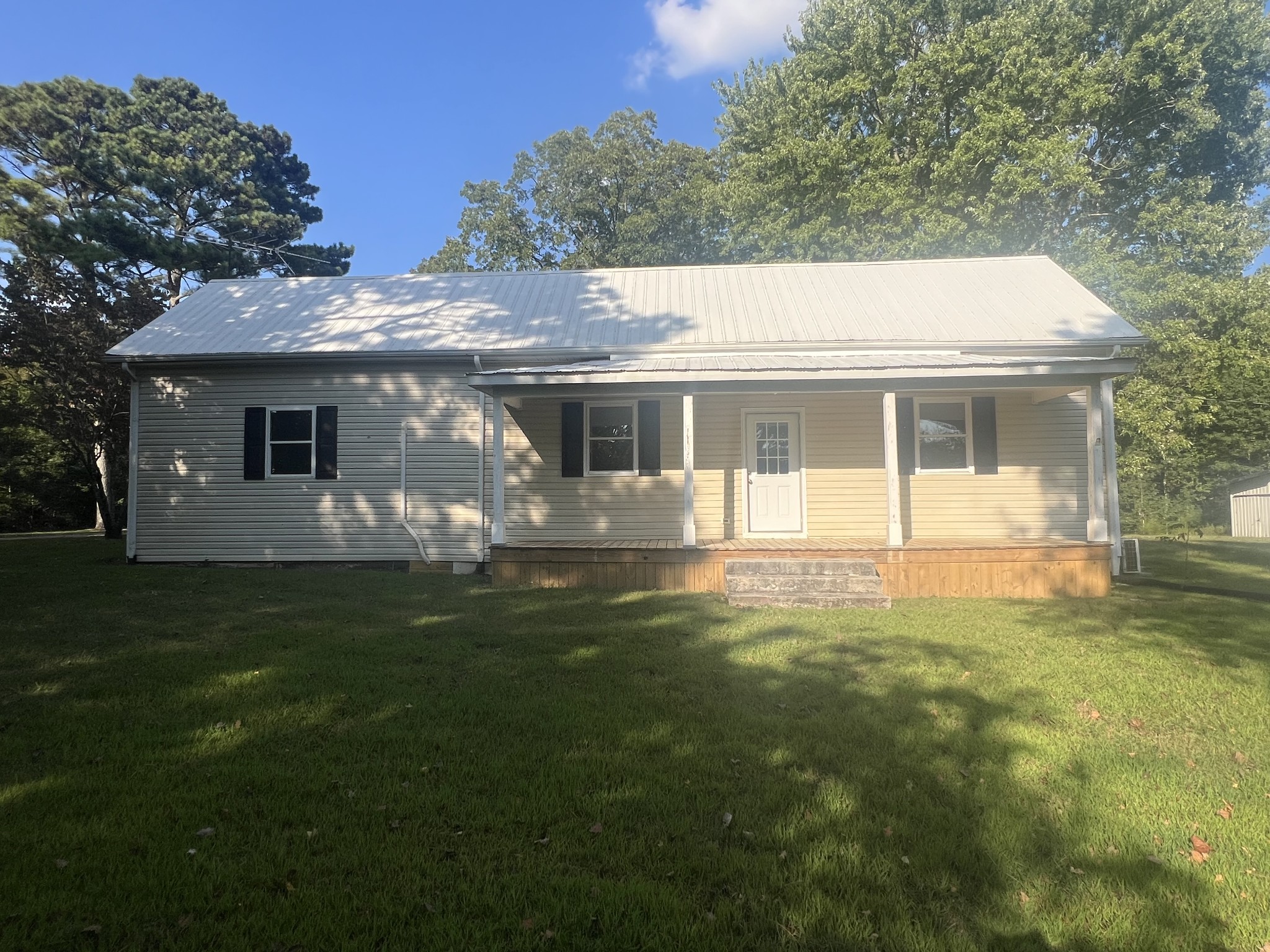 161 Woodlawn Road Pulaski, TN 38478 - Photo 39 of 46 a front view of house with yard and green space