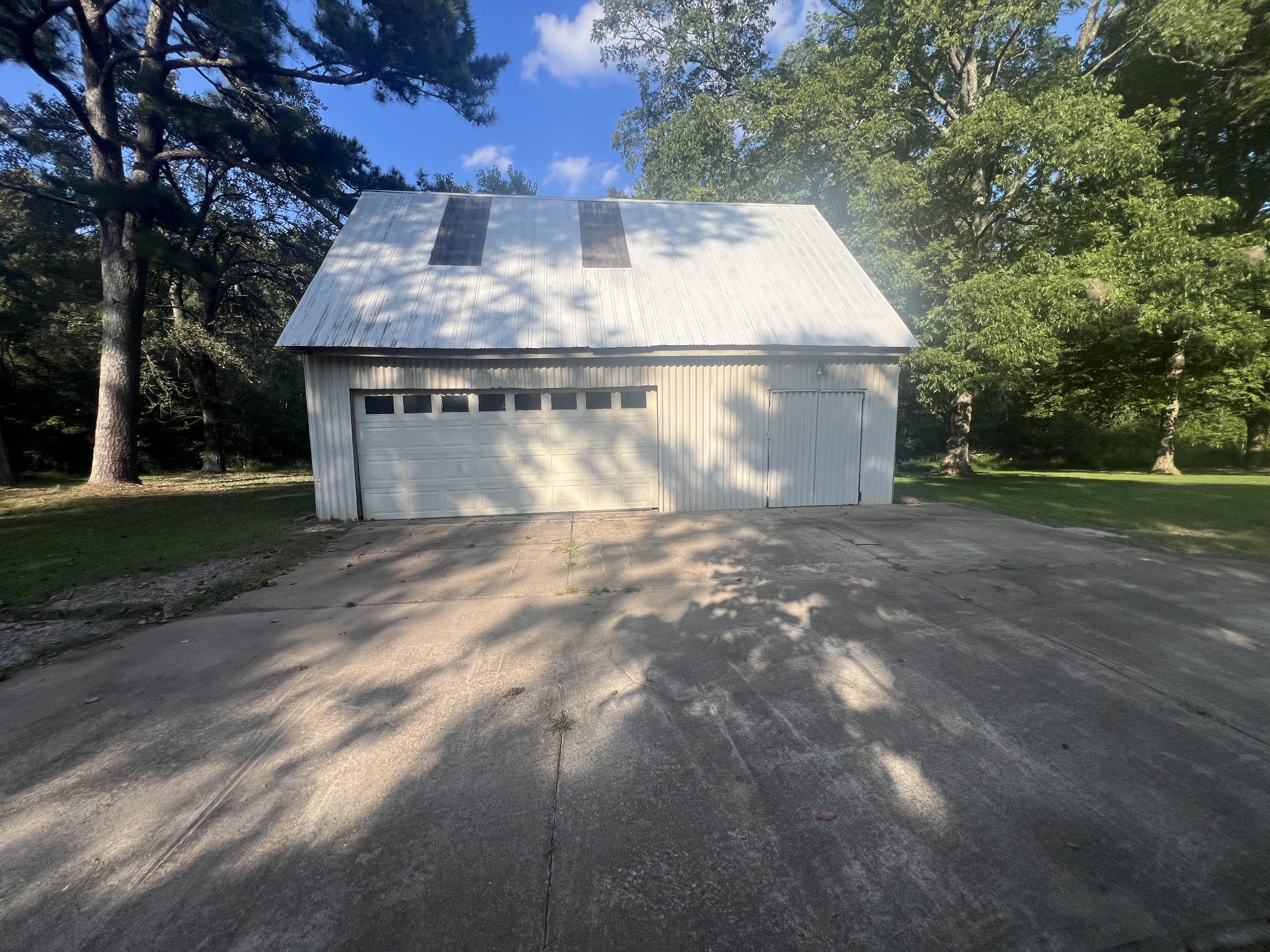 161 Woodlawn Road Pulaski, TN 38478 - Photo 42 of 46 a view of a house with a yard