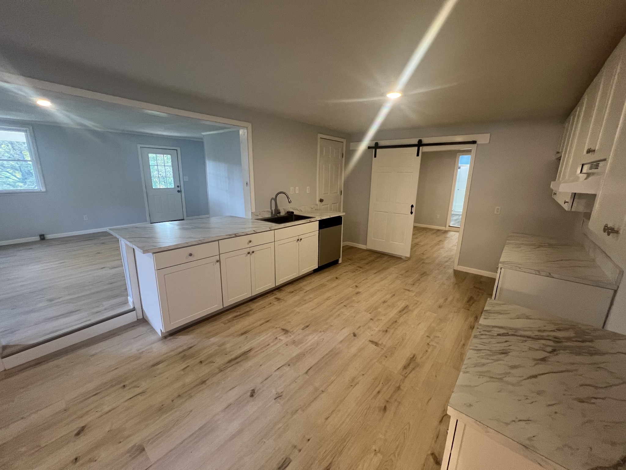 161 Woodlawn Road Pulaski, TN 38478 - Photo 10 of 46 a large kitchen with a wooden floor