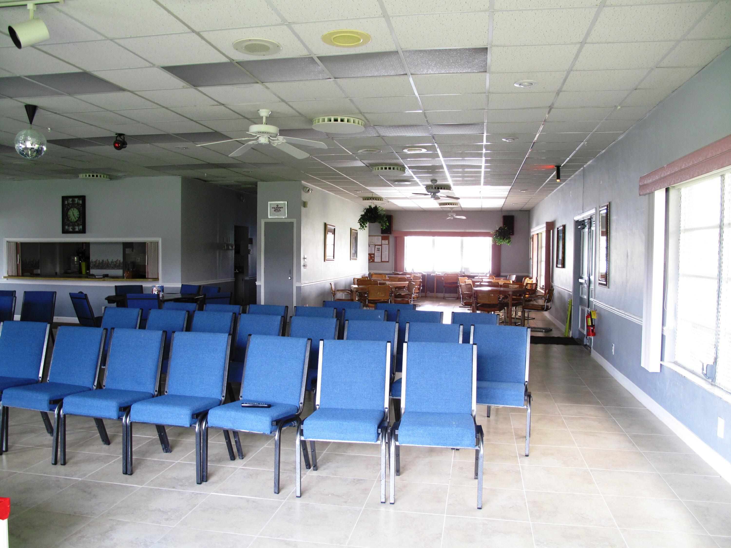 1305 High Point Way Southeast, Unit D Delray Beach, FL 33445 - Photo 46 of 53 a view of a dining room with furniture