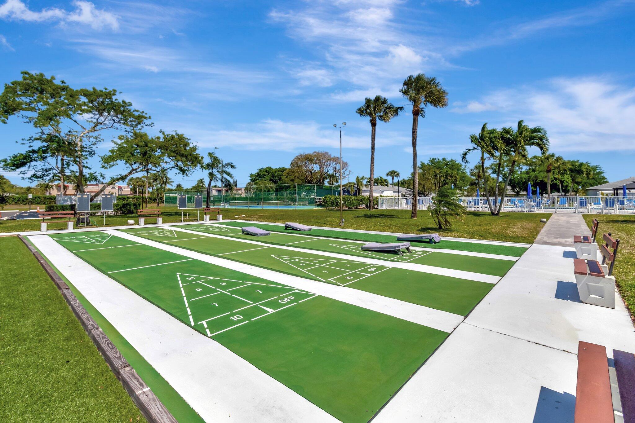 1305 High Point Way Southeast, Unit D Delray Beach, FL 33445 - Photo 49 of 53 a view of a tennis court