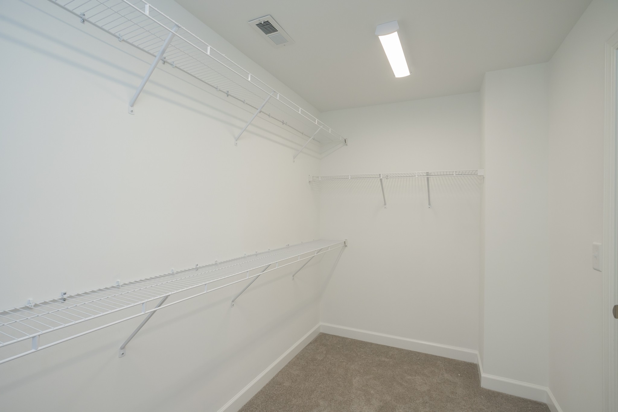 6008 Cavalry Ct Spring Hill Spring Hill, TN 37174 - Photo 30 of 42 a view of a room with racks on the wall