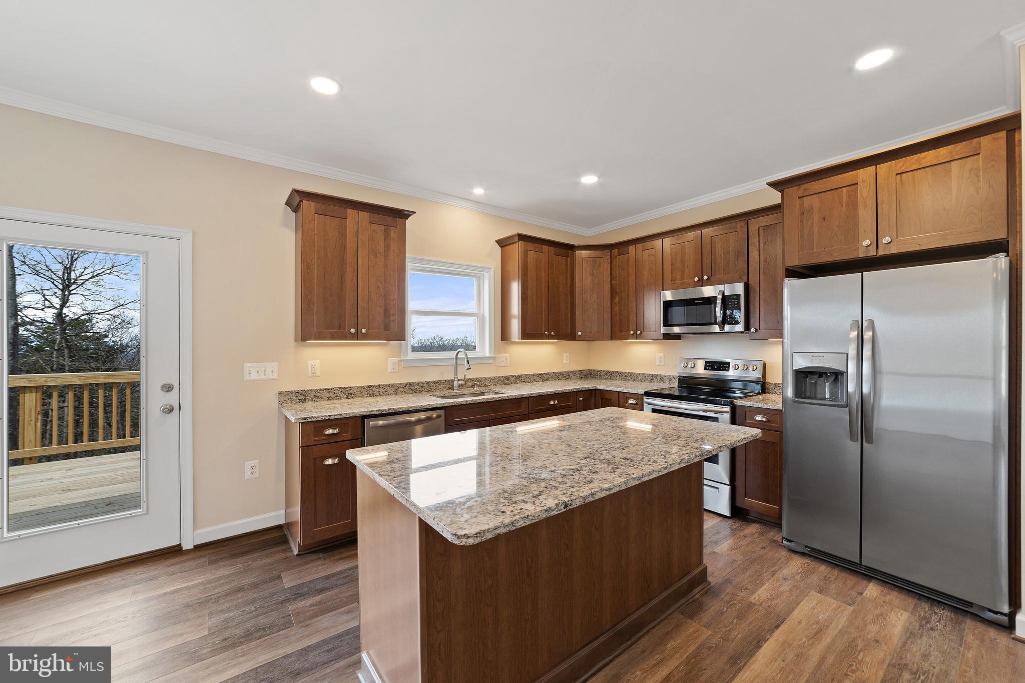 24 Markham Farm Road Front Royal, VA 22630 - Photo 8 of 32 Kitchen island and stainless appliances