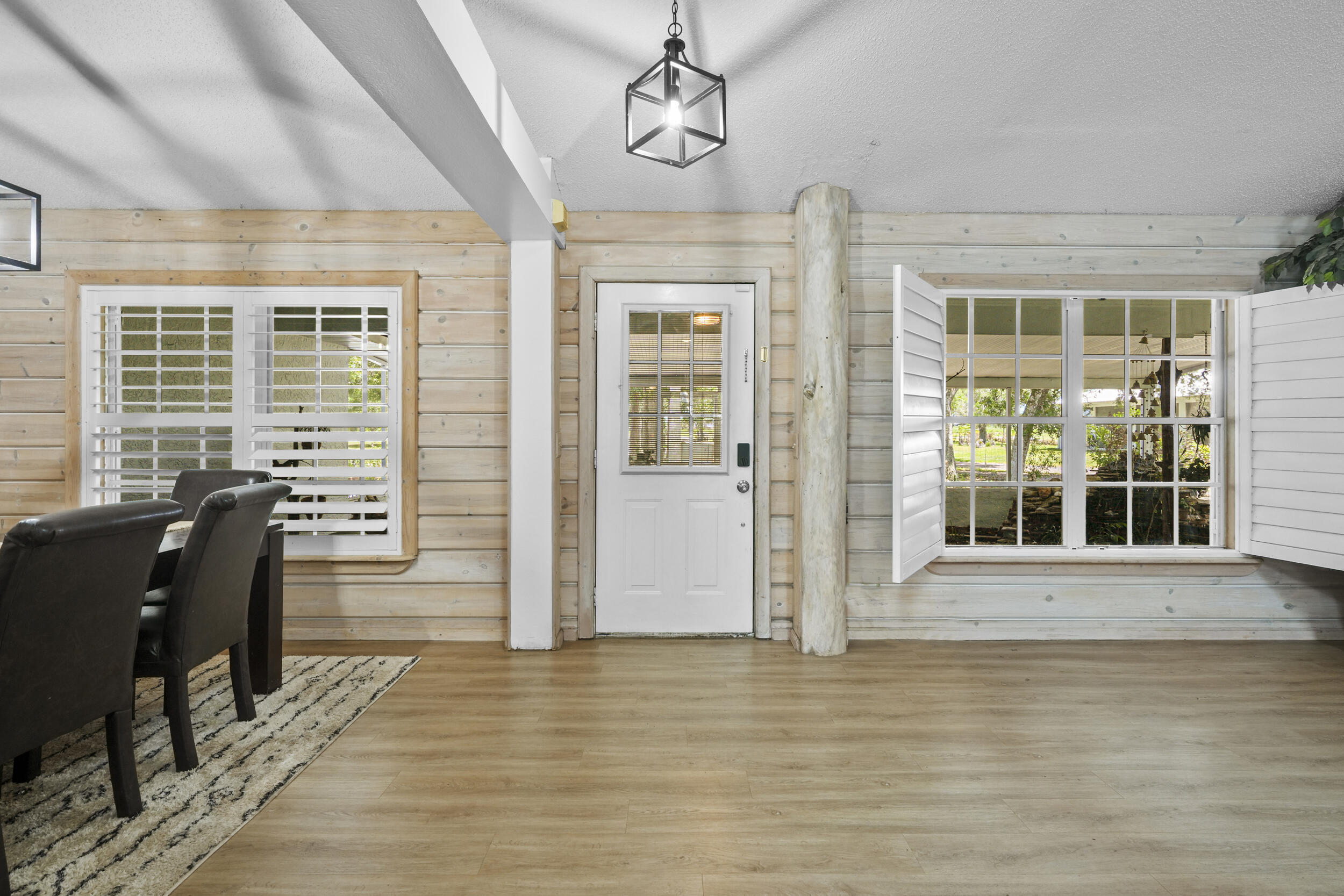 6289 South Header Canal Road Port St. Lucie, FL 34987 - Photo 28 of 52 Foyer and dining on left