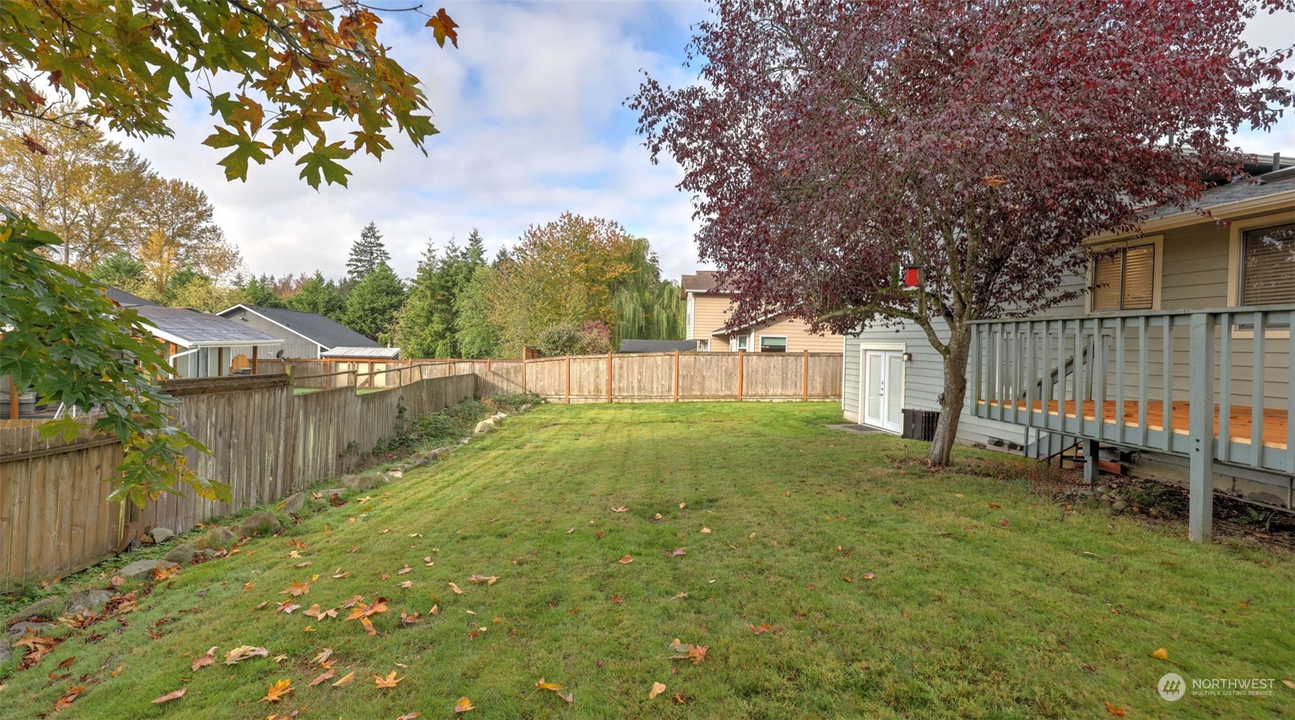 1232 220th Place Southwest Bothell, WA 98021 - Photo 24 of 24 a view of backyard with wooden fence