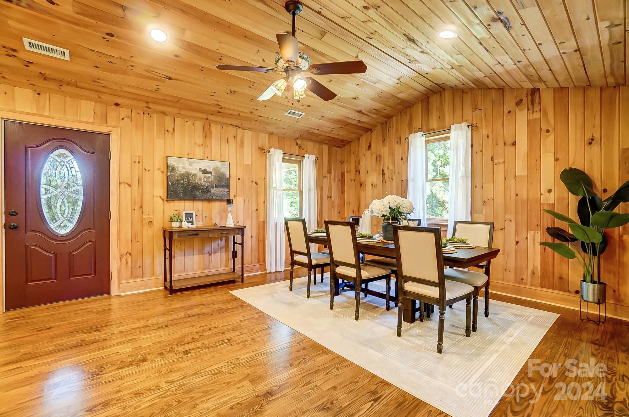 6338 Talley Road Stanfield, NC 28163 - Photo 11 of 48 a view of a dining room with furniture window and wooden floor