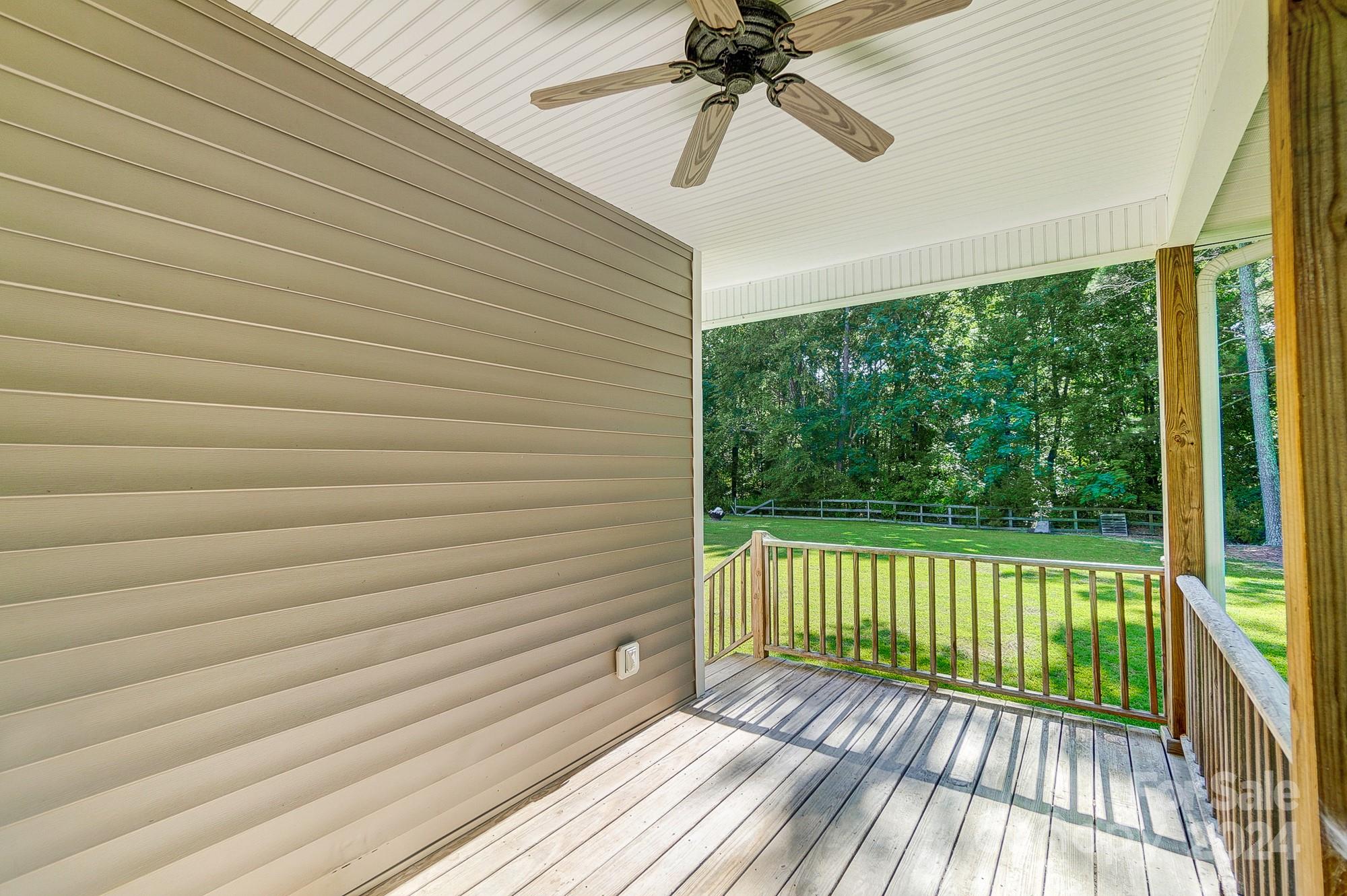 6338 Talley Road Stanfield, NC 28163 - Photo 40 of 48 a view of a two chairs in the balcony
