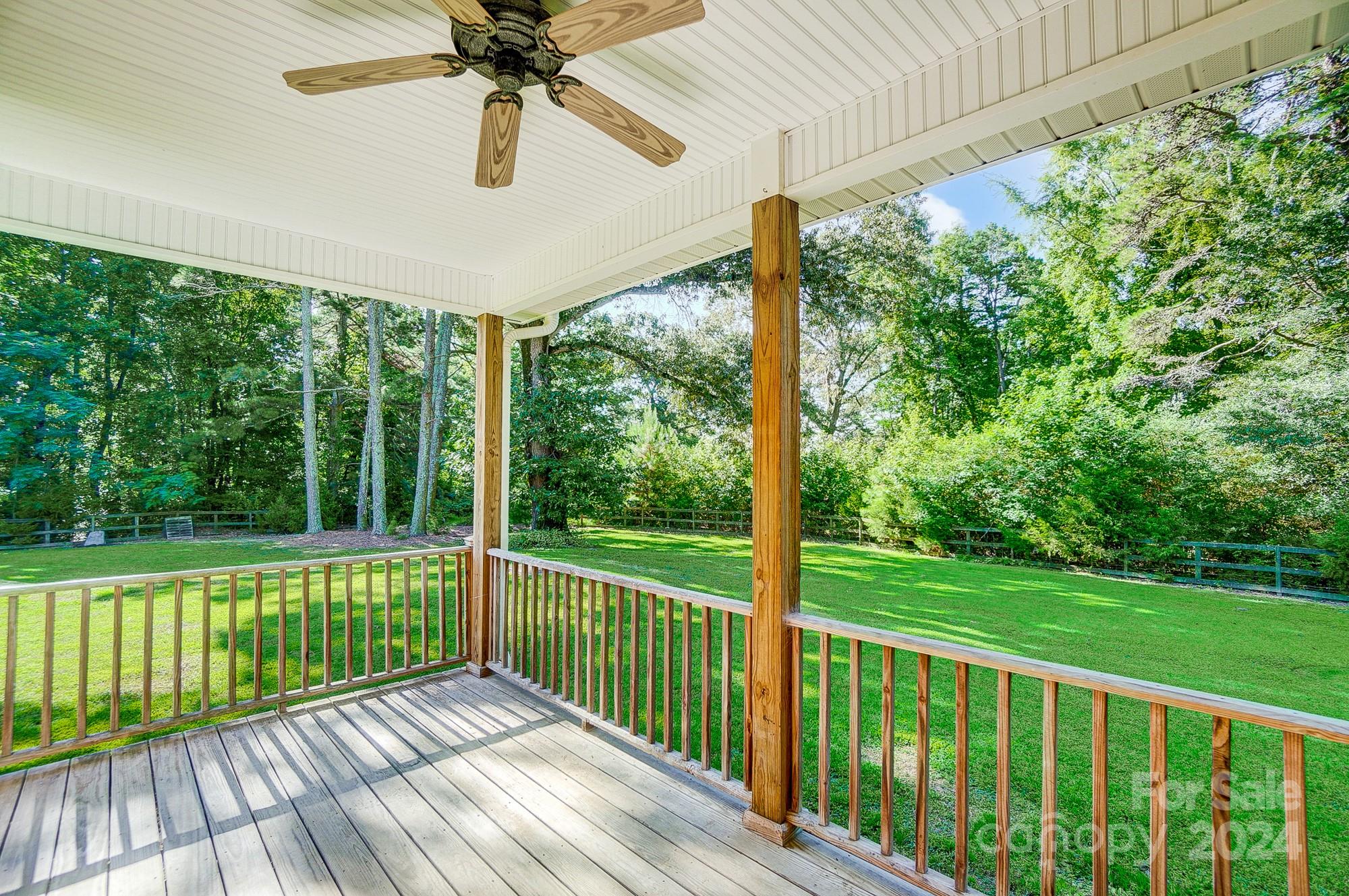 6338 Talley Road Stanfield, NC 28163 - Photo 41 of 48 a view of a room with a large trees and wooden fence