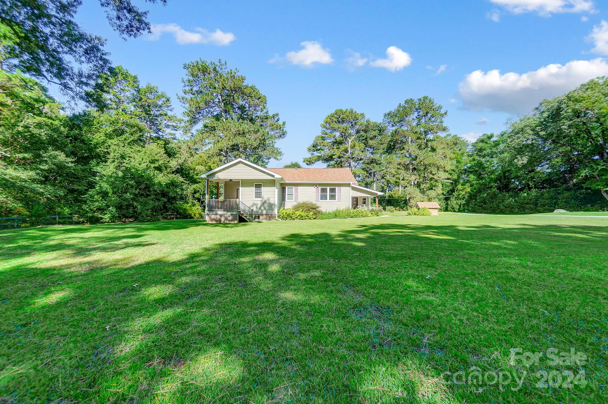 6338 Talley Road Stanfield, NC 28163 - Photo 45 of 48 a house view with a garden space