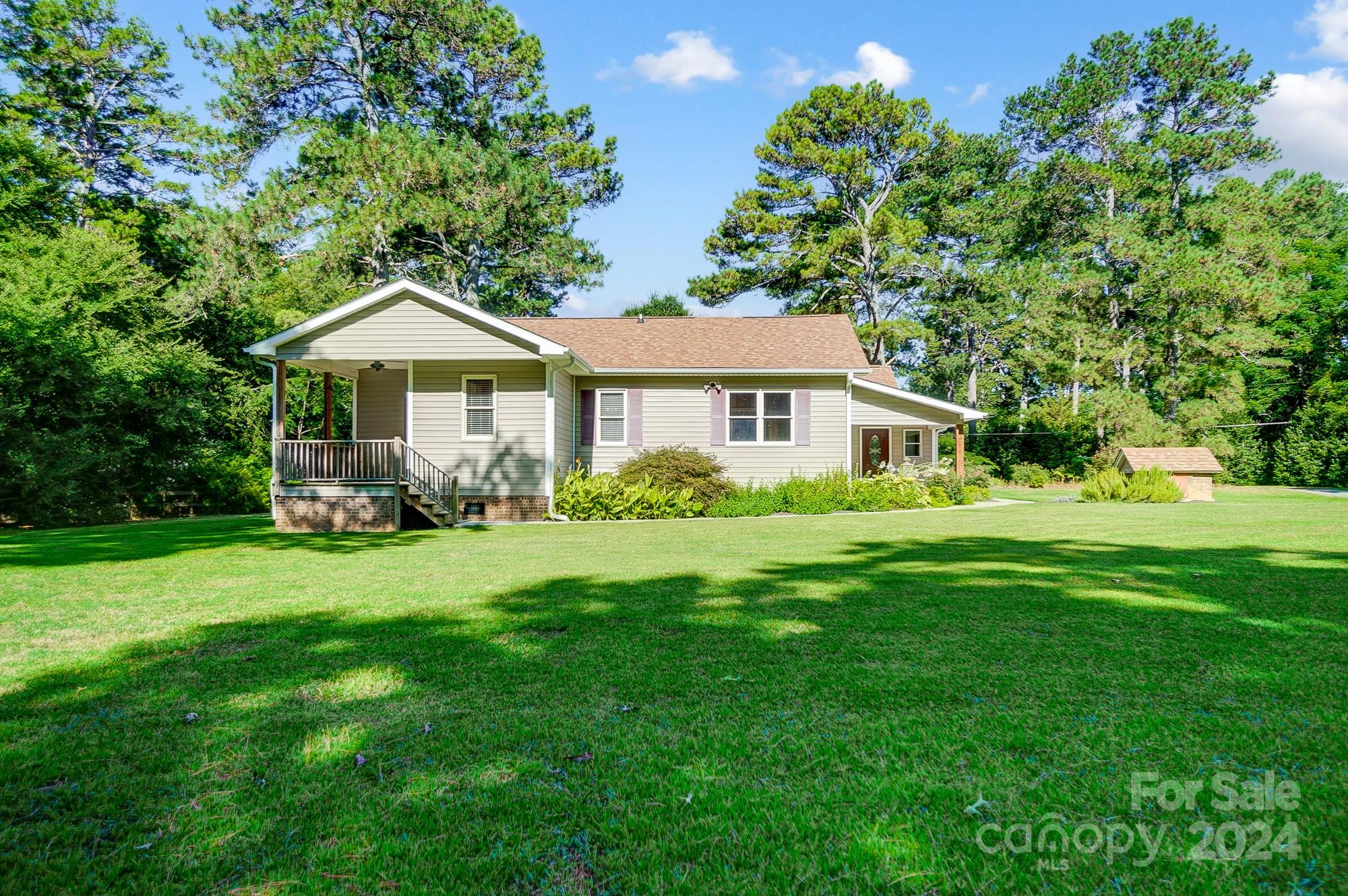 6338 Talley Road Stanfield, NC 28163 - Photo 46 of 48 a front view of a house with a yard