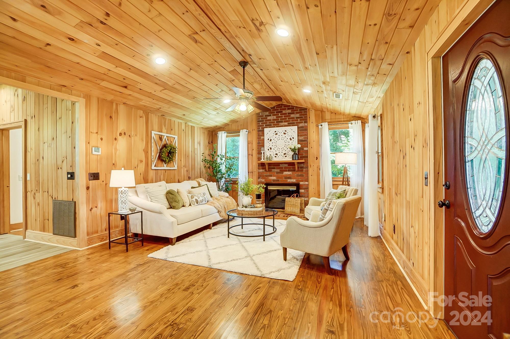 6338 Talley Road Stanfield, NC 28163 - Photo 7 of 48 a living room with furniture and a large window