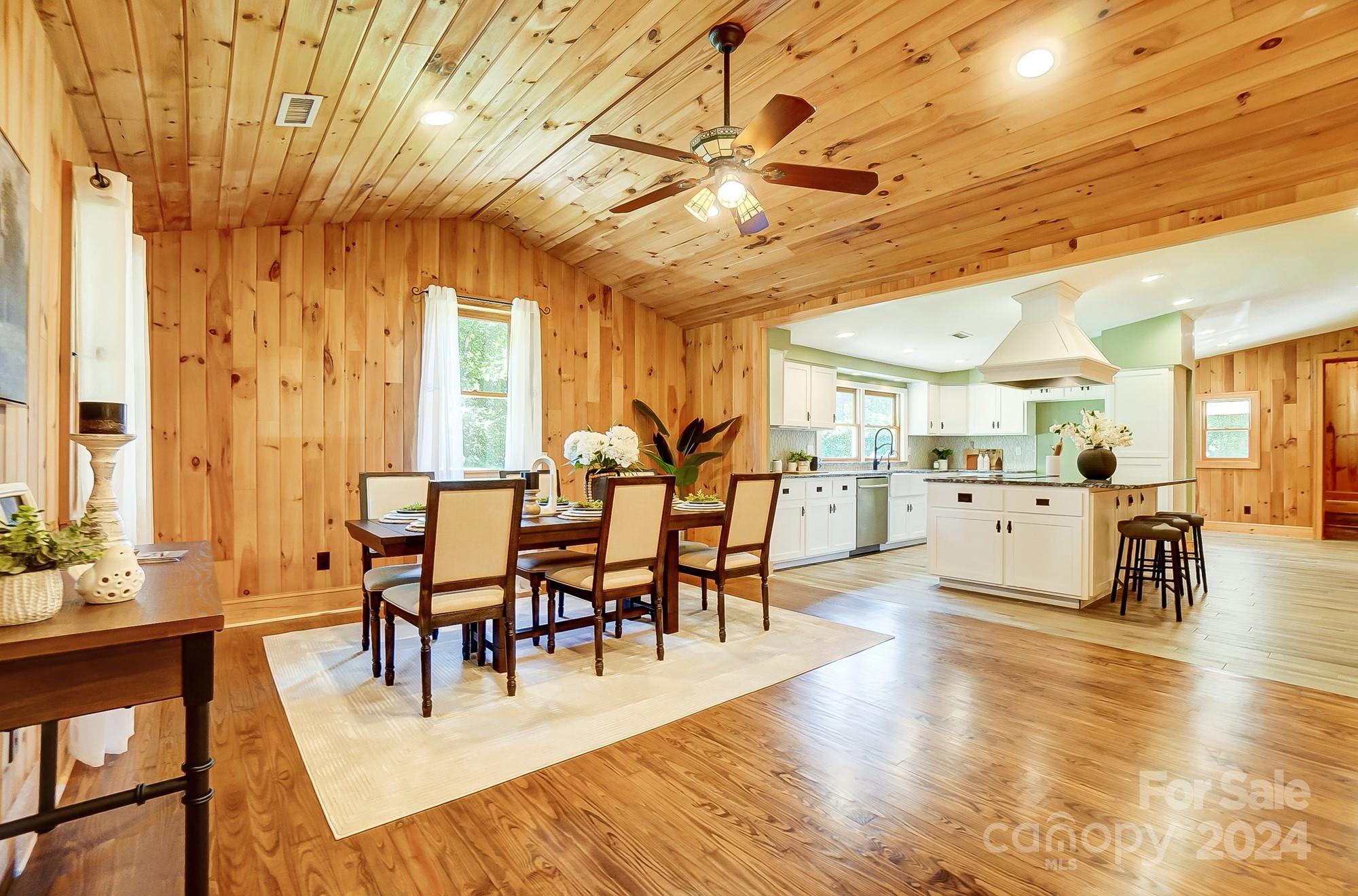 6338 Talley Road Stanfield, NC 28163 - Photo 10 of 48 a view of a dining room with furniture and wooden floor