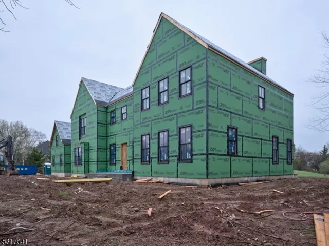 a view of a large building next to a yard